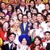 Prime Minister Pham Minh Chinh in a group photo with representatives of the Vietnamese community in China’s Yunnan province. (Photo: VNA)