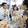 Visitors at the event showcasing the quintessence of craft villages and regional specialties 2024 in HCM City. (Photo: VNA)