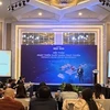 At the seminar co-hosted by the Vietnam E-Commerce Association (VECOM) and Access Partnership in Hanoi on December 16. (Photo: VNA)