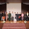 Delegates at the ceremony in Brunei on December 17 commemorating the 80th anniversary of the Vietnam People’s Army (VPA) and the 35th anniversary of the All-People’s Defence Festival (December 22). (Photo: VNA)