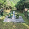 广南省边防部队与赛公省军事指挥部检查691号界碑。图自《人民军队报》