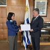 帕格尼尼接受越南驻阿根廷兼驻乌拉圭大使吴明月递交国书副本。图自越通社