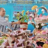 素食节活动在香江北岸边迎涼亭举行。图自越通社