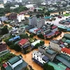 河江市从6月9日夜间至6月10日下午连日遭遇强降雨，整个城市被大雨淹没。。图自越通社