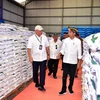 President Joko Widodo (right) during his visit to the Bulog warehouse in Muna district. (Photo: en.antaranews.com) 