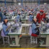 Workers produce clothes at a garment factory in Batang District, Central Java, (Photo:en.antaranews.com)