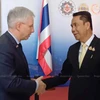 Jean-Claude Poimbœuf, Ambassador of France (L), shakes hands with Thai Defence Minister Sutin Klungsang at the opening of the 'Thailand-France Seminar on Defence Industry 2024' at the Office of the Permanent Secretary for Defence on July 15. (Photo: bangkokpost.com) 