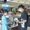 Passengers at Noi Bai International Airport (Photo: hanoimoi.vn)