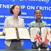 Indonesian Energy and Mineral Resources Minister Bahlil Lahadalia (right) and British Development Minister Anneliese Dodds pose on Sept. 18, 2024 with copies of a memorandum of understanding on critical minerals at a signing ceremony in Jakarta. (Photo: thejakartapost.com) 