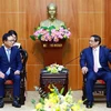 PM Pham Minh Chinh meets with General Director of Samsung Vietnam Choi Joo Ho (Photo: VNA)