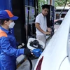 Petrol prices down slightly in latest adjustment on Dec 12 (Photo: VNA)