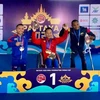 L'haltérophile Le Van Cong (centre) remporte trois médailles d'or au Coupe du monde de Pattaya 2024. Photo: PARALIFTING