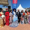 Des ao dai du Vietnam présentés aux Fêtes consulaires à Lyon. Photo: VNA