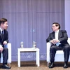 El primer ministro de Vietnam, Pham Minh Chinh y el titular de la Asociación surcoreana de Investigación de Innovación Global, y expresidente de la Asamblea Nacional de Corea del Sur, Kim Jin Pyo (Fuente: VNA)