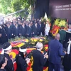 La ceremonia de entierro del secretario general Nguyen Phu Trong en el cementerio Mai Dich (Fuente: VNA)