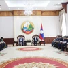 En el encuentro entre el primer ministro de Laos, Sonexay Siphandone y la delegación de la Academia de Ciencias y Tecnología de Vietnam (Fuente: VNA)