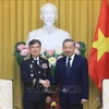 El secretario general del Partido Comunista y presidente de Vietnam, To Lam y Kim Jong Uk, comandante de la Guardia Costera de Corea del Sur (Fuente: VNA)