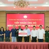 En la ceremonia de entrega de la donación de Wilmar CLV a Quang Ninh (Foto: baoquangninh.vn)