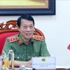 El ministro de Seguridad Pública de Vietnam, Luong Tam Quang, durante las conversaciones telefónicas con la secretaria de Estado del Departamento del Interior del Reino Unido, Yvette Cooper (Fuente: VNA)