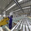 The DOC decided to impose a preliminary anti-subsidy tax rate of 2.85% and 41.84% on aluminium extrusions and products imported from Vietnam. (Photo: tapchicongthuong.vn)