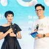 Artist Cao Thanh Tha shares experience in volunteering in Con Dao National Park at the opening ceremony of the exhibition. (Photo courtesy of the IUCN)
