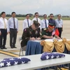 At the 165th handover of the US servicemen’s remains at the Da Nang International Airport in central Da Nang city on June 26. (Photo: VNA)