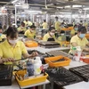 Production at handbag manufacturer Simone Vietnam Co Ltd's factory in Long An province (Photo: VNA)