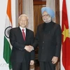 Party General Secretary Nguyen Phu Trong (L) and Indian Prime Minister Manmohan Singh in New Delhi on November 20, 2013. (Photo: VNA)