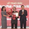 The Grand Prize is presented to film-maker Dang Nhat Minh in 2023. (Photo: VNA)