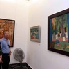 Visitors to the art exhibition (Photo: VNA)