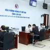 At the one-door administrative unit of the Public Administration Service Center in Lao Cai province (Photo: VNA)