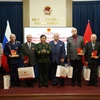 At the meeting in Moscow to honour Russian veterans' contributions to the struggle for Vietnam's independence and reunification. (Photo: VNA)