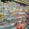 A customer shops at a supermarket in Hai Ba Trung district, Hanoi (Photo: VNA)