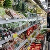 A shopper at Co.op mart in Hanoi (Photo: VNA)