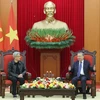 Party General Secretary To Lam (R) receives President and CEO of NVIDIA Jensen Huang in Hanoi on December 6. (Photo: VNA)