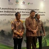 Presidential Special Envoy for Energy and Environment Hashim Djojohadadikusumo (centre) delivers a statement to the press in Jakarta on December 10. (Photo: ANTARA) 