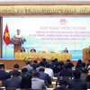 PM Pham Minh Chinh chairs the hybrid conference on December 12. (Photo: VNA)