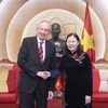 Chairwoman of the National Assembly’s Committee for Judicial Affairs and President of the Vietnam – Poland Friendship Parliamentarians' Group Le Thi Nga (R) receives Secretary of State at the Ministry of Foreign Affairs of Poland Władysław Teofil Bartoszewski on December 12. (Photo: VNA)