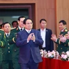 PM Pham Minh Chinh visits the National Defence Academy on December 12. (Photo: VNA)