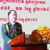 Vietnamese defence attaché Colonel Tran Van Tam speaks at the celebration in Cambodia on December 12. (Photo: VNA)