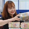 The banks’ total deposits in the first nine months of this year increase by 7.2% against the same period last year. (Photo: cafef.vn)