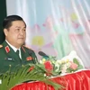 Political Commissar of the Vietnam National Defence Academy Lieut. Gen. Do Van Banh speaks at the event on December 12. (Photo: VNA)