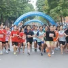 Runners in the 49th Hanoi Moi Newspaper Run for Peace (Photo: VNA)