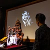 Portrait of Party leader illuminated through light sculpture