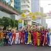 Ao dai parade impresses tourists in Nha Trang resort city