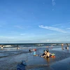 Xuan Thanh beach attracts tourists