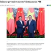 新华社报道越南政府总理范明政和中国国务院总理李强。图自越通社