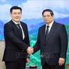 越南政府总理范明政接见泰国总理特使。图自越通社
