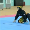 Una atleta malasia en una prueba de Pencak Silat en los XIII Juegos Escolares de la ASEAN en Da Nang el 3 de junio. (Foto: VNA)