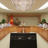 El viceprimer ministro de Vietnam, Tran Hong Ha, preside una reunión sobre el proyecto de establecimiento de un mercado de carbono. (Fuente: VNA)